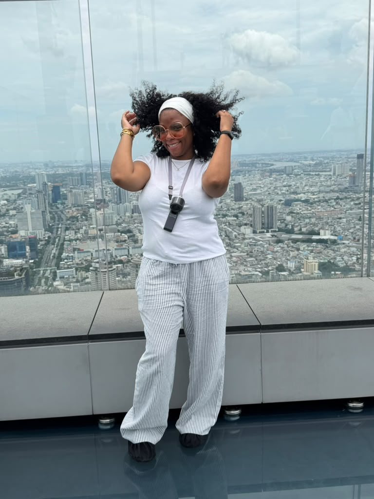 Traveler enjoying a panoramic view of Bangkok